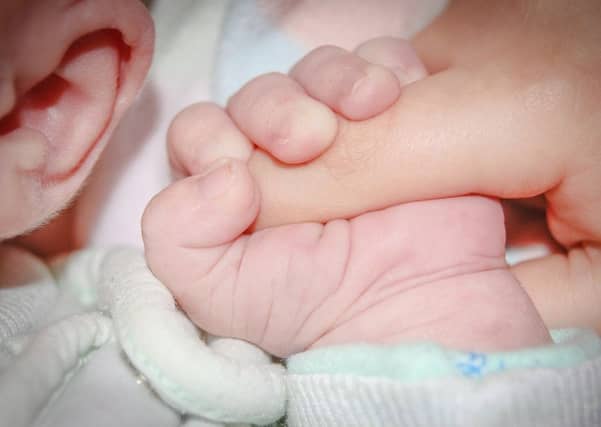 Baby daughter Heather Ridsdill was delivered with the help of her quick-thinking father