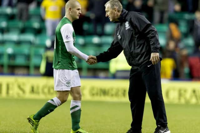 Collins with former Hibs boss Terry Butcher. Picture: SNS Group