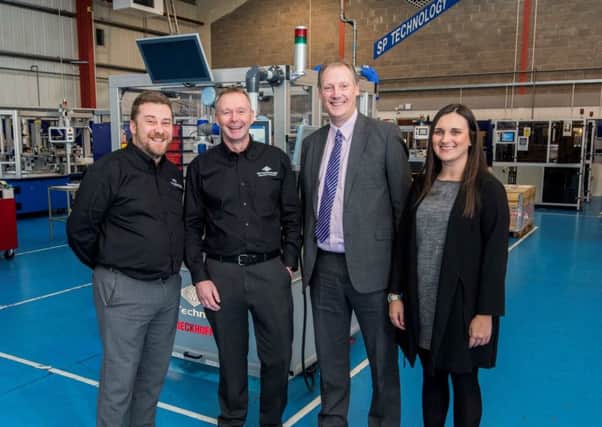 From left: Lee Nixon and Roy Henderson ,directors at SP Technology, with David Morrison and Sandi Drummond of EQ Accountants. Picture: Contributed