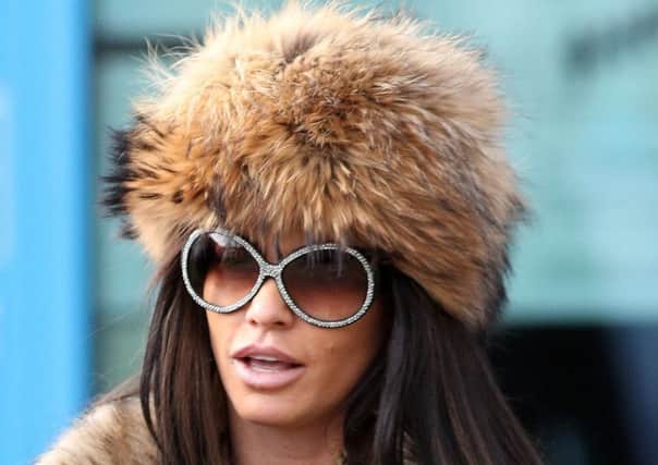 Katie Price leaves Crawley Magistrates' Court after she was banned from driving for three months and fined £1,100 for driving while disqualified and without insurance on the A24 near her home in West Sussex. Picture: Andrew Matthews/PA Wire