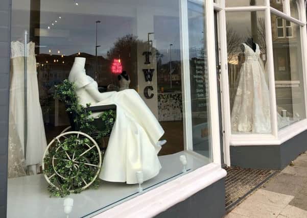 The White Collection bridal shop window with a mannequin in a wheelchair. Picture: Beth Wilson/PA Wire