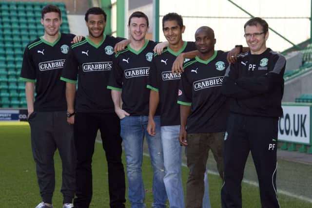 Manager Pat Fenlon, right, along with five of his signings. Picture: SNS