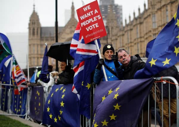 Demonstrators call for a Peoples Vote on whether the UK should press ahead with Brexit (Picture: Tolga Akmen/AFP/Getty)