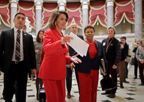 Speaker of the House Nancy Pelosi and fellow Democrat Barbara Lee head for the floor of the House of Representatives (Picture: Chip Somodevilla/Getty Images)