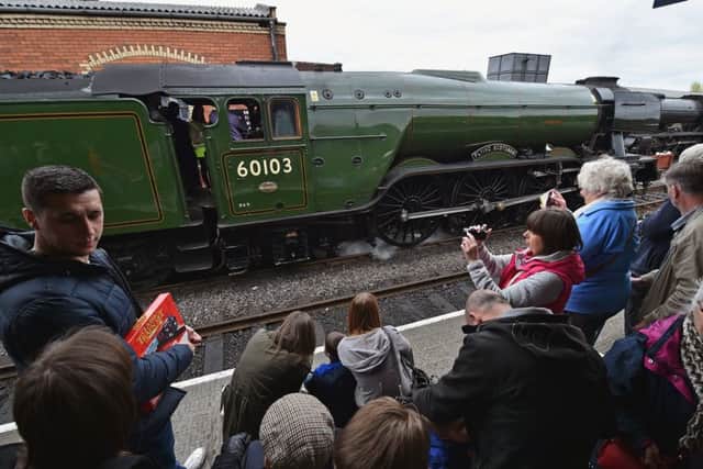 Top: train enthusiasts admire Flying Scotsman on a visit to Boness in 2016. Picture: Jeff J Mitchell/Getty