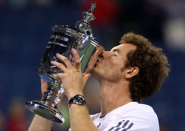 Andy Murray kisses the US Open trophy after defeating Novak Djokovic in the 2012 final to clinch his first grand slam title. Picture: Getty Images