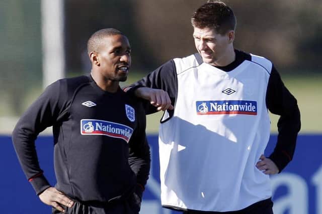 Jermain Defoe with his new boss at Rangers, Steven Gerrard, during training for the England national team in 2010. Picture: PA