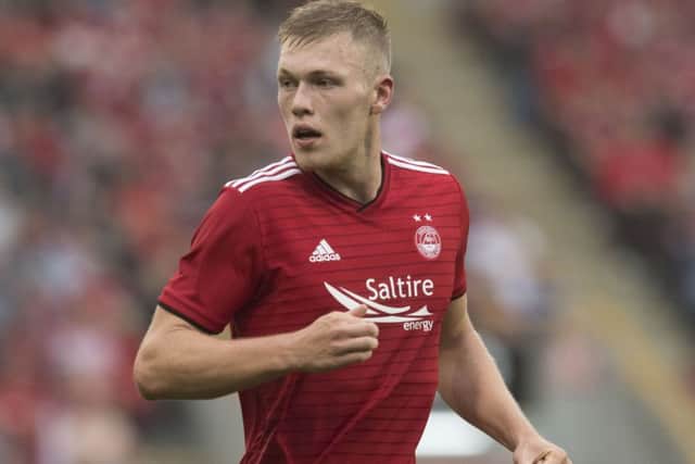 Aberdeens Sam Cosgrove learned the hard way as he served a tough apprenticeship while being farmed out on loan by Wigan Athletic. Picture: SNS.