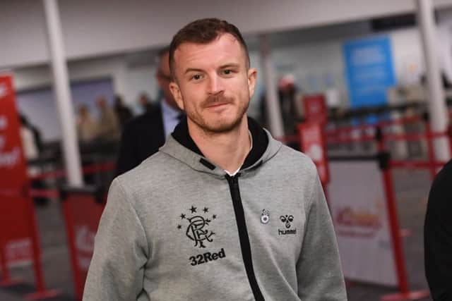 Andy Halliday set the tone for the Old Firm derby with a crunching tackle on Olivier Ntcham. Picture: SNS.
