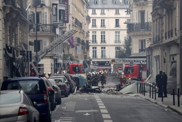 Firefighters intervene after the explosion of a bakery on the corner of the streets Saint-Cecile and Rue de Trevise in central Paris. Picture: AFP/Getty Images