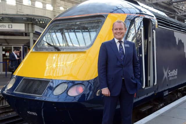 Alex Hynes with one of the refurbished High Speed Trains. Picture: Jon Savage