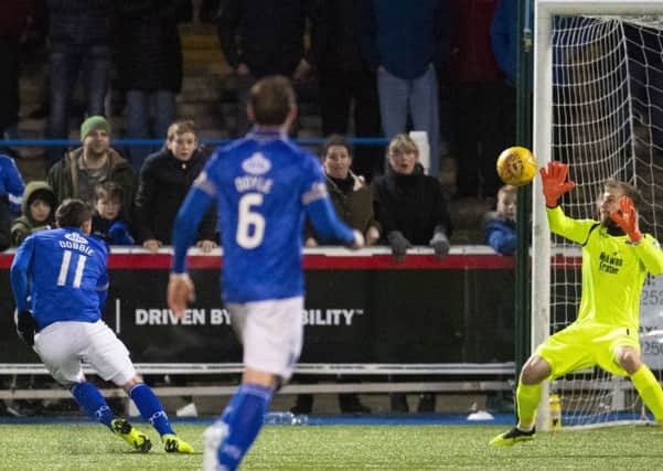 Queen of the South's Stephen Dobbie scores again to make it 4-0. Picture: Craig Foy/SNS