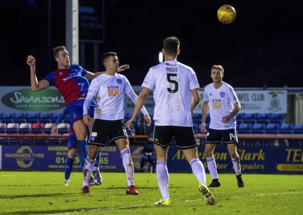 Inverness Caley Thistle's Jordan White heads in the only goal of the game. Picture: Ross MacDonald/SNS