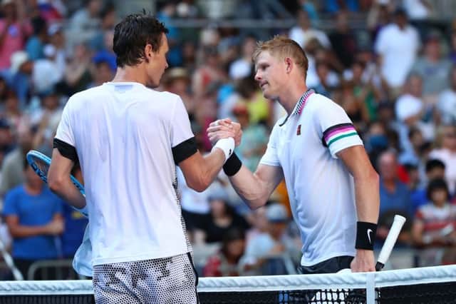 Kyle Edmund with Tomas Berdych after their Australian Open first-round match. Picture: Getty Images