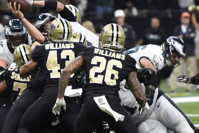 Philadelphia Eagles quarterback Nick Foles leaps into the end zone for a touchdown during the defeat by New Orleans on Sunday. Picture: Bill Feig/AP