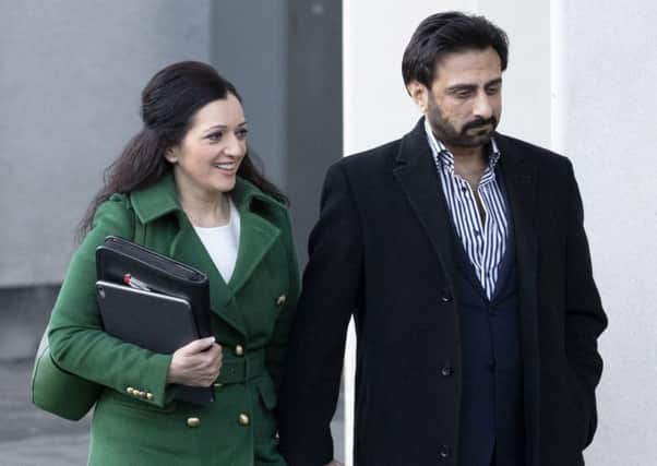 Tasmina Ahmed-Sheikh (left) and her husband Zulfikar Sheikh arrive for the Solicitors' Discipline Tribunal hearing at Perth Concert Hall. Picture: Jane Barlow/PA