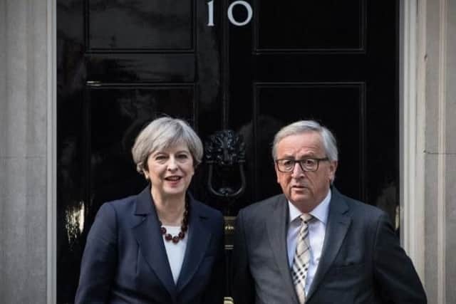 Theresa May meeting EU Commission president Jean-Claude Juncker at Downing Street