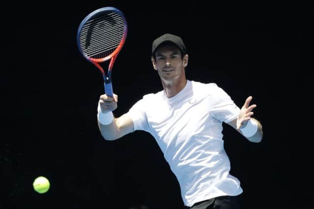 Britain's Andy Murray hits a forehand return during a practice session ahead of the Australian Open tennis championships in Melbourne, Australia, Saturday, Jan. 12, 2019. (AP Photo/Kin Cheung)