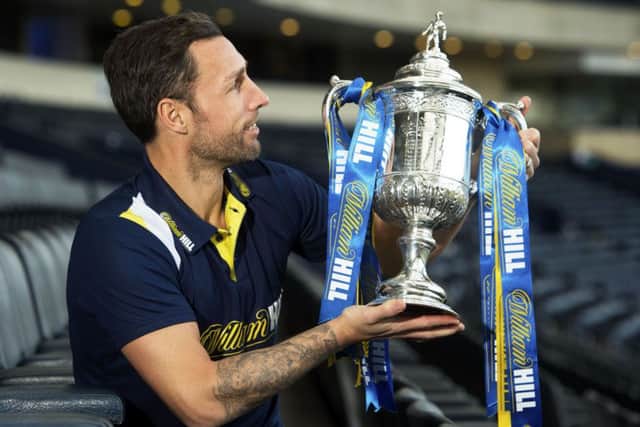 Scott Mcdonald with the Scottish Cup at a William Hill media event.