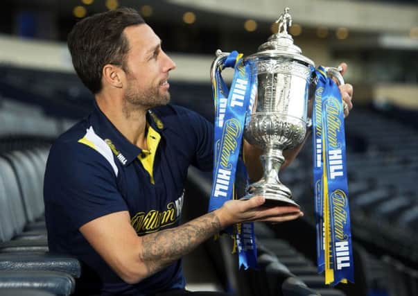Scott Mcdonald with the Scottish Cup at a William Hill media event.