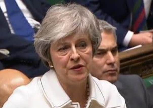 Prime Minsiter Theresa May addresses MPs on the eve of the 'meaningful vote' on her Brexit deal