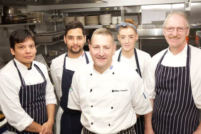 William Thomson (centre) will lead a nine-strong team as group executive head chef at Quiet Man Taverns. Picture: DB Media Serivces