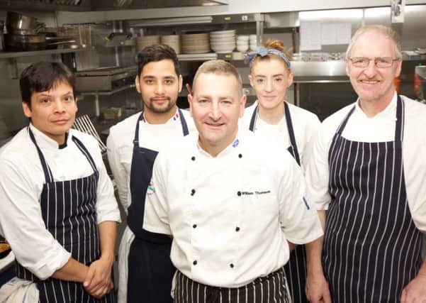 William Thomson (centre) will lead a nine-strong team as group executive head chef at Quiet Man Taverns. Picture: DB Media Serivces