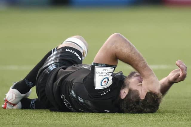 Glasgow Warriors' Callum Gibbins suffers an injury against Cardiff. Picture: Rob Casey/SNS