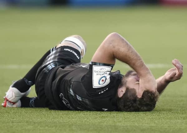 Glasgow Warriors' Callum Gibbins suffers an injury against Cardiff. Picture: Rob Casey/SNS