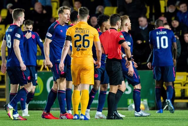 Arnaud Djoum is sent off by Nick Walsh. Picture: SNS/Ross Parker