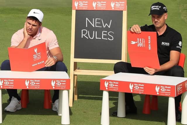 Brooks Koepka and Henrik Stenson get to grips with the new rules for 2019. Picture: Andrew Redington/Getty Images