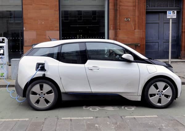 A new electric car charging. Picture: John Devlin