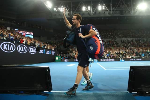 Andy Murray thanks the crowd after losing his first round match against Roberto Bautista Agut. Picture: Getty