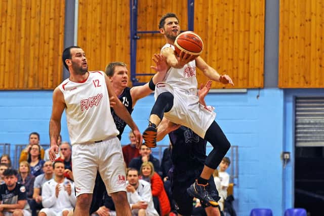 Bantu Burroughs goes for the basket. Picture Michael Gillen.