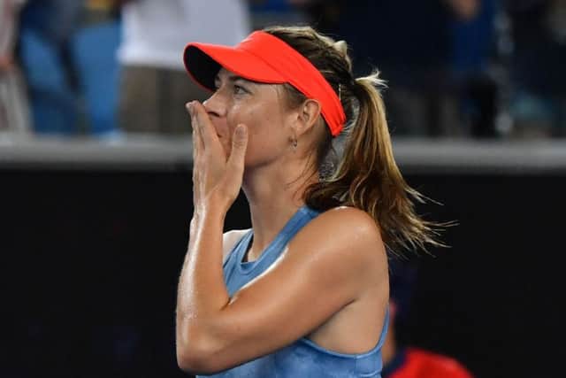 Russia's Maria Sharapova celebrates after victory over Sweden's Rebecca Peterson. Picture: AFP/Getty Images