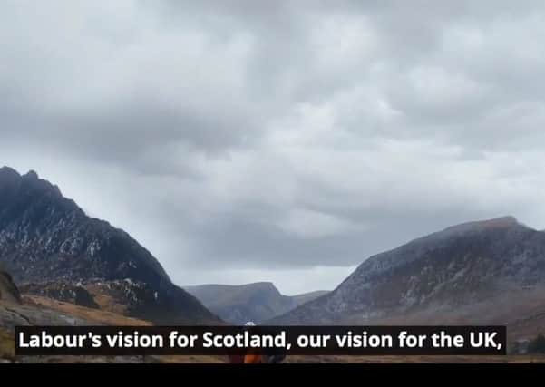 A screenshot from Scottish Labour's latest campaign video, with Tryfan mountain in the background