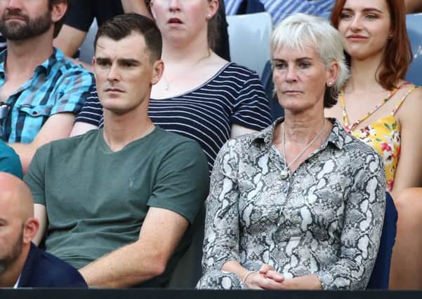 Jamie and Judy Murray watch Andy in action in Melbourne last week but now she is looking for money for her centre. Photograph: Cameron Spencer/Getty Images