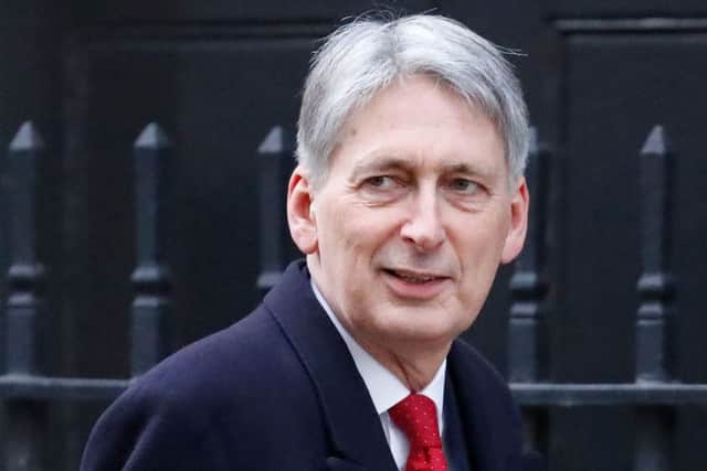 Britain's Chancellor of the Exchequer Philip Hammond stated that Brexit defeat raises two questions. Picture: PA