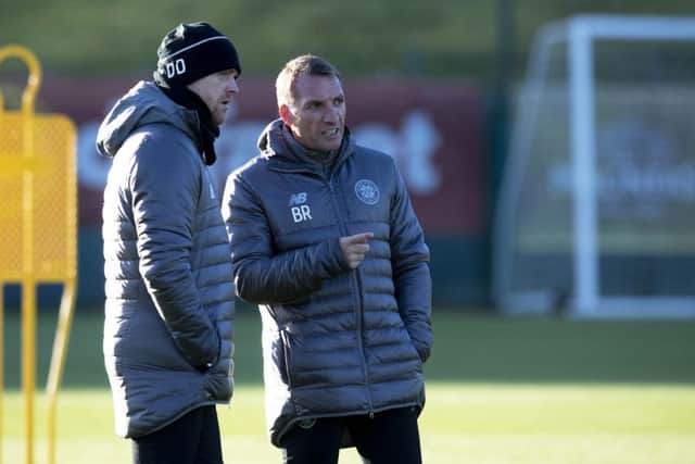 Brendan Rodgers chats with Damien Duff at Lennoxtown. Picture: SNS Group
