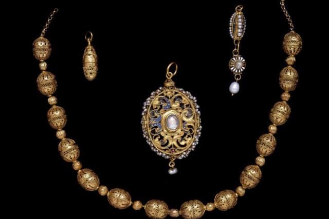 Mary took great pleasure in a magnificent jewellery collection with this 16th Century gold necklace, locket and pendant featuring a miniature of the Queen and her son James.