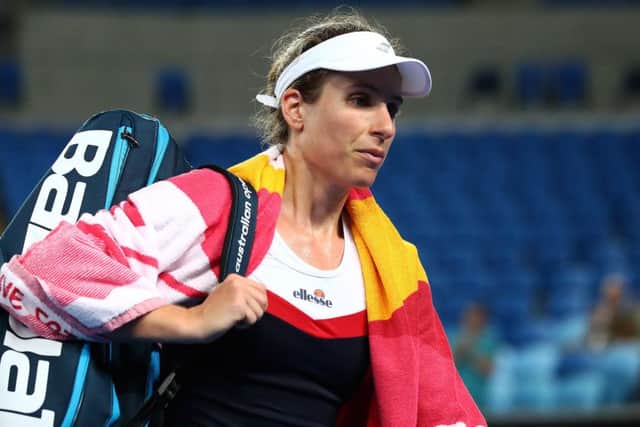 Johanna Konta walks off court after her loss to Garbine Muguruza. Picture: Julian Finney/Getty Images