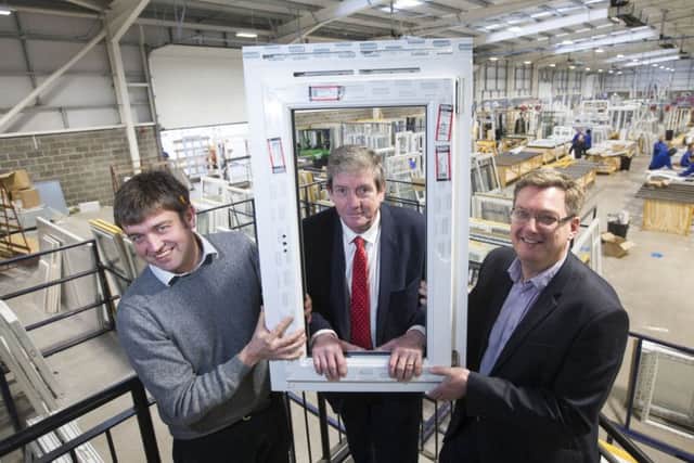 L to R: Martin Smith and Robert McKnight of Scotia Double Glazing with Scott Webb, UKSE. Picture: Jeff Holmes