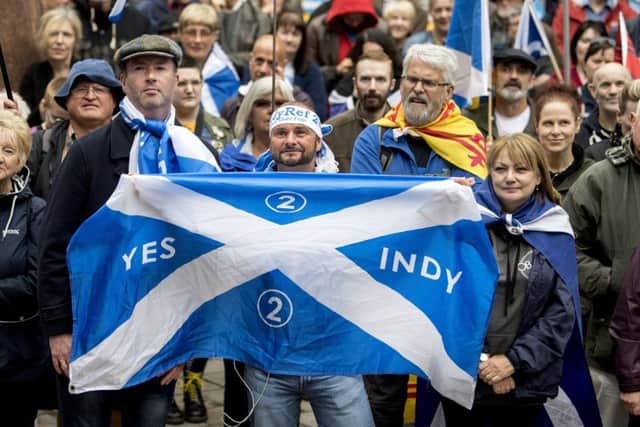 Campaigners for IndyRef2 on the streets of Glasgow in July 2018. Picture: John Devlin