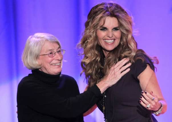 Poet Mary Oliver, left, with journalist Maria Shriver (Photo by Frederick M Brown/Getty Images)