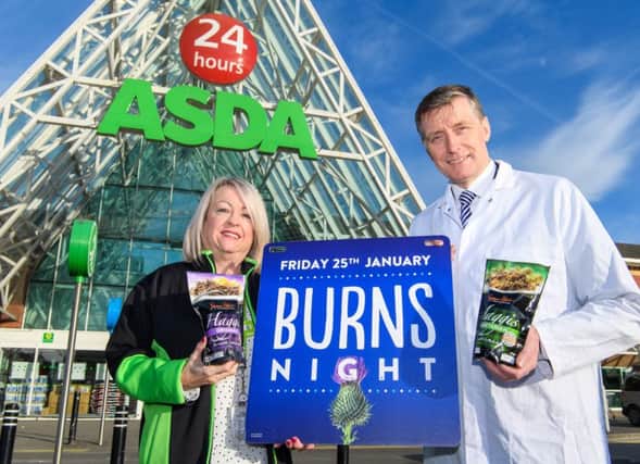 Yvonne McArthur, trading assistant with Asda, and butcher Simon Howie, ahead of Burns Night. Picture: Ian Georgeson