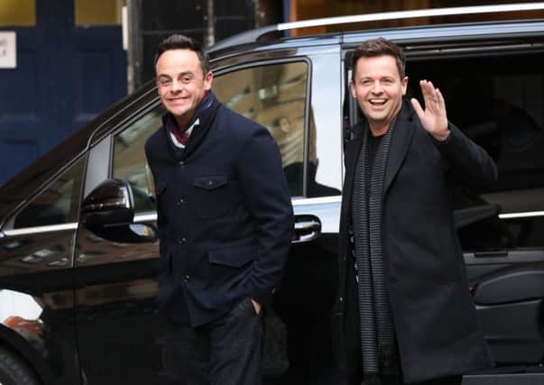A smiling Anthony McPartlin (left) and Declan Donnelly arrive at Britain's Got Talent auditions at the London Palladium. Picture: PA