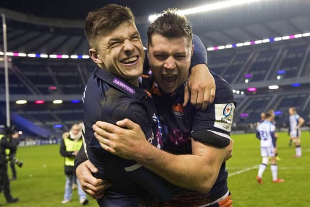 Celebration time for Edinburgh pair Blair Kinghorn and Grant Gilchrist. Picture: SNS