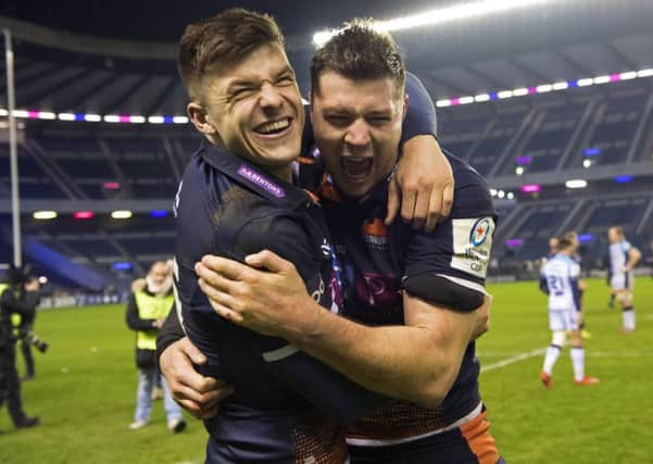 Celebration time for Edinburgh pair Blair Kinghorn and Grant Gilchrist. Picture: SNS