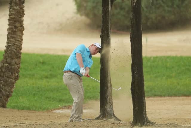 Bob MacIntyre plays a recovery shot from the desert in the final round of the Abu Dhabi HSBC Championship. Picture: Warren Little/Getty Images