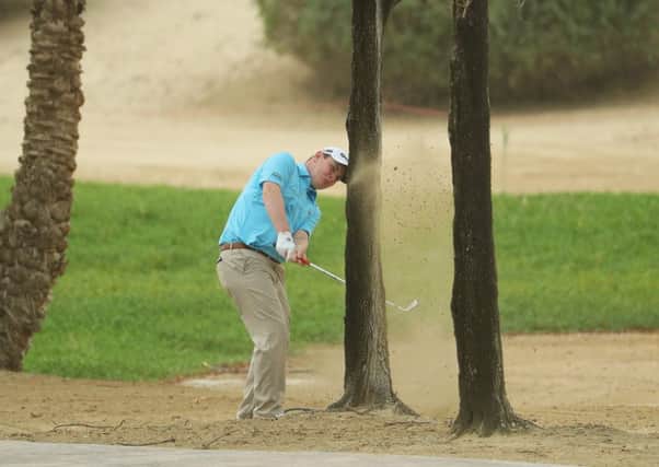 Bob MacIntyre plays a recovery shot from the desert in the final round of the Abu Dhabi HSBC Championship. Picture: Warren Little/Getty Images
